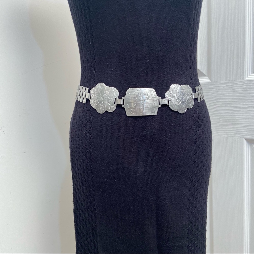 Vintage sliver tone coin and trunk medallion and link belly chain belt. Used